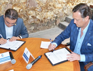 Firma Kuri convenio con SNE