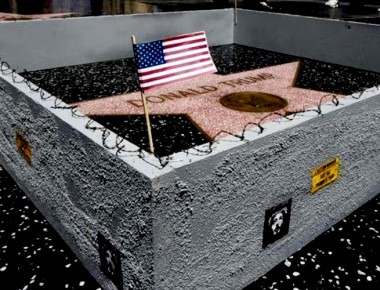 Construyen muro en estrella de Donald Trump