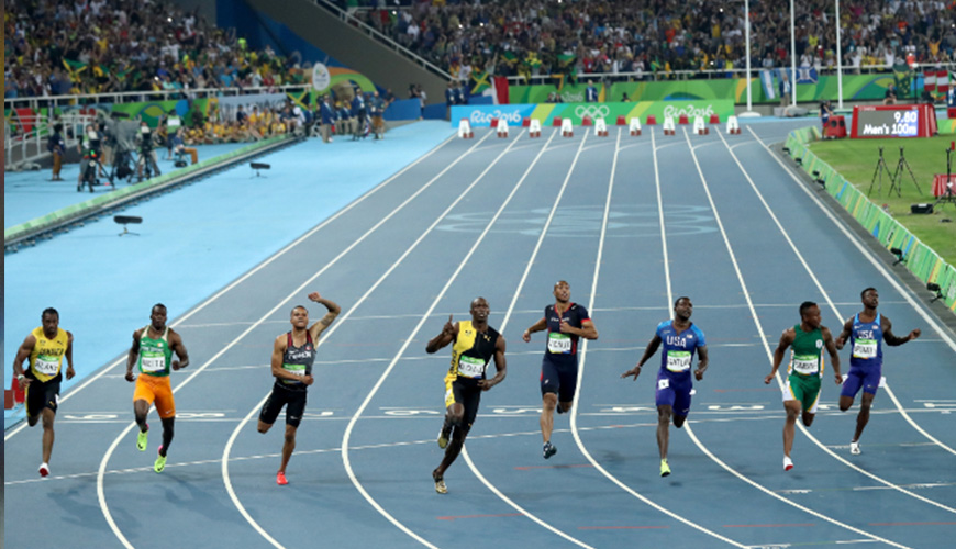Usain Bolt de Jamaica gana los 100 metros planos delante de Justin Gatlin de Estados Unidos y Andre De Grasse de Canadá. (Foto: Ezra Shaw/Getty Images)